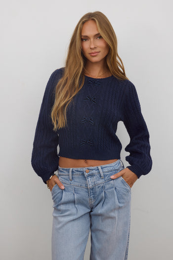 long sleeve sweater with navy bows 
