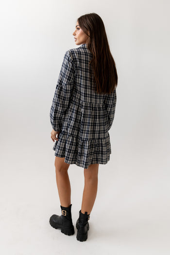 Collared Neckline
Long Sleeves with Elastic Cuffs