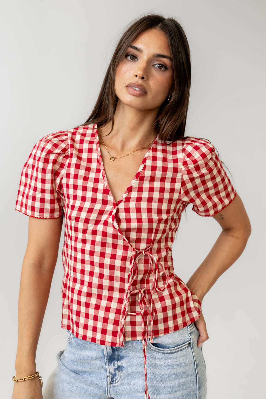 snap and souble tie closure on front of blouse 