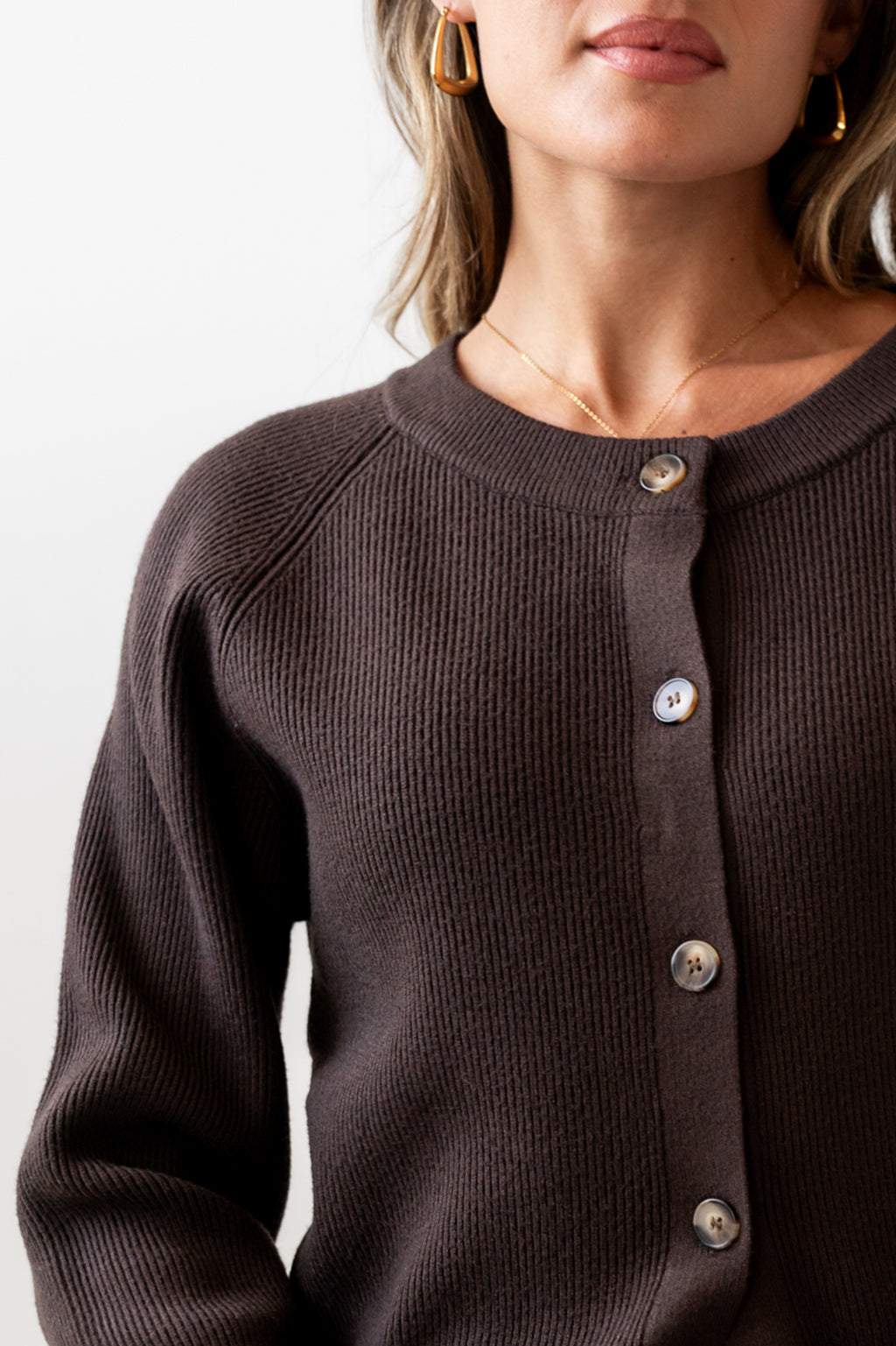 buttons up the front of sweater