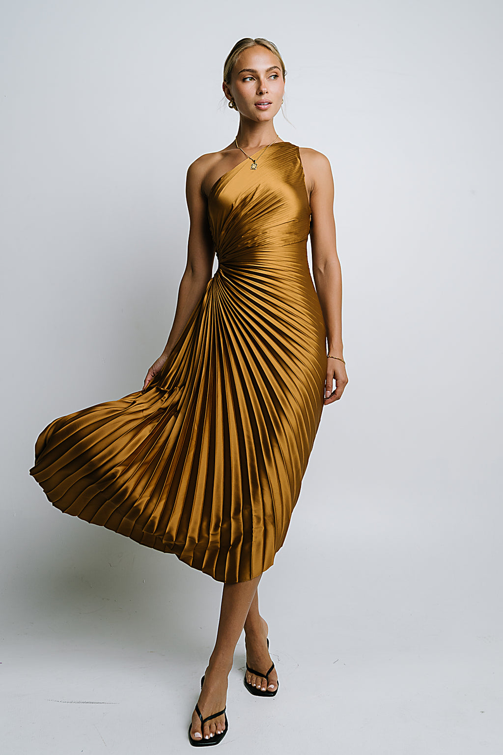 Asymmetrical Pleated Maxi Dress in Gold Asymmetrical Pleated Maxi Dress in Gold