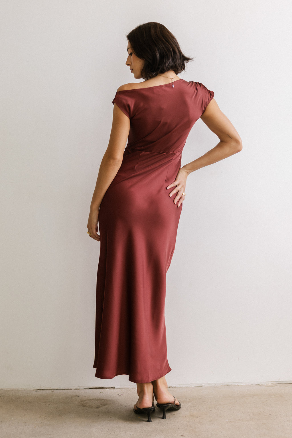Rodney Asymmetrical Maxi Dress in Burgundy Rodney Asymmetrical Maxi Dress in Burgundy