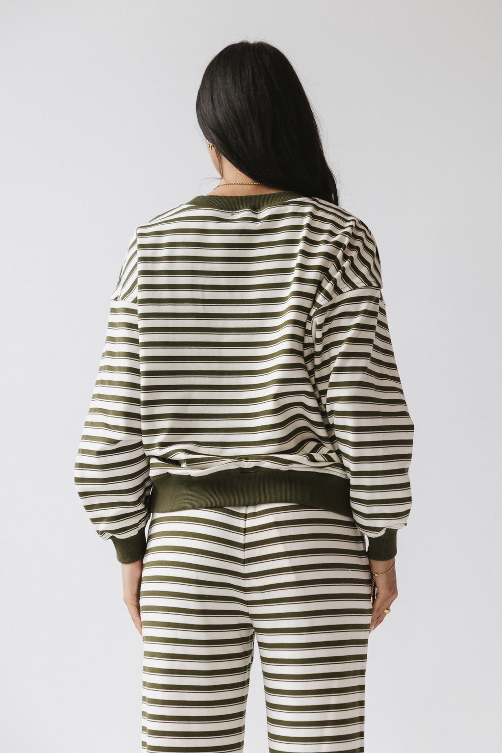 olive green top with long sleeves