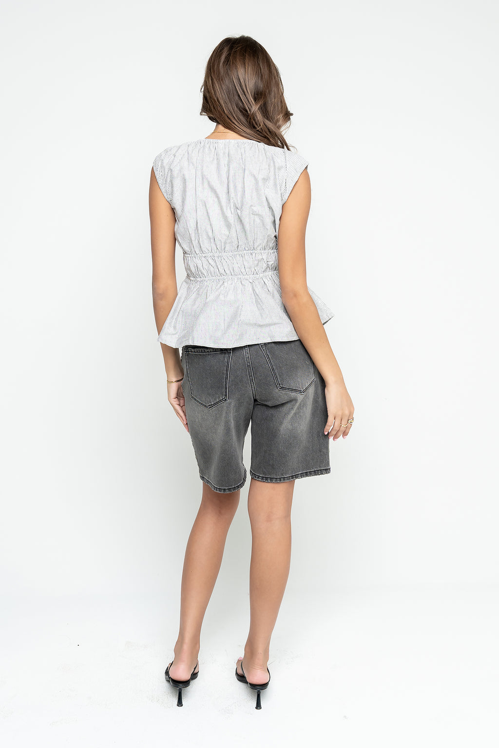 Krista Peplum Top in Black
