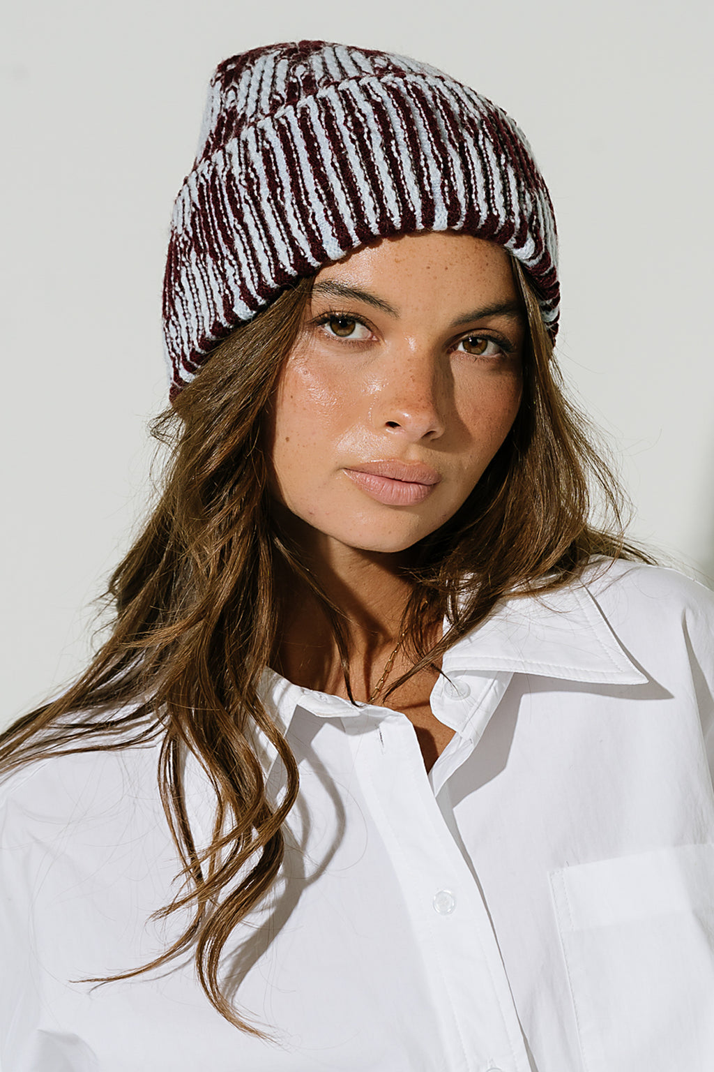 Gemma Reversible Beanie in Wine