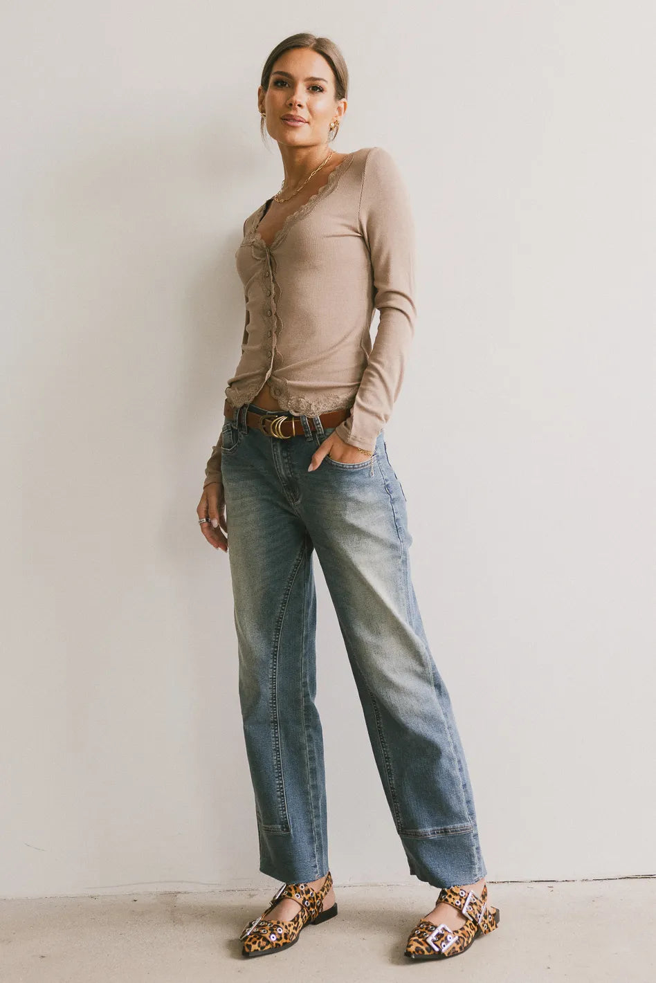 Top in taupe paired with denim 