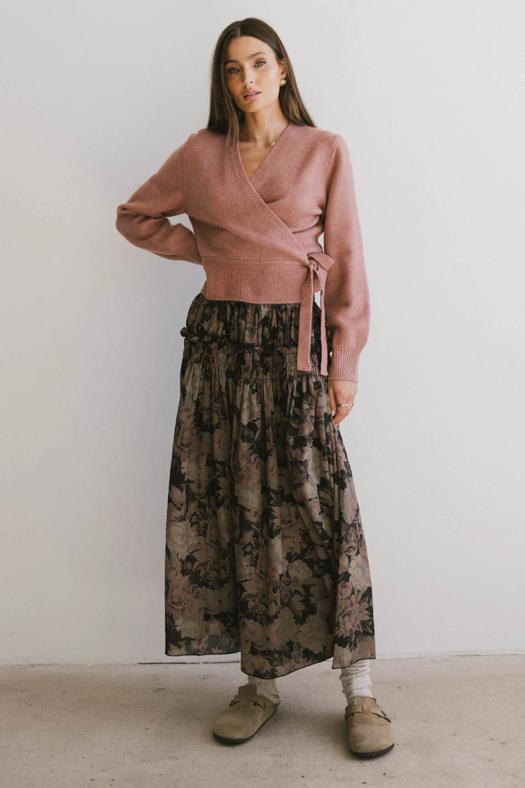 Woven maxi skirt paired with a rose cardigan 