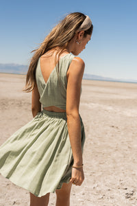 Sleeveless Sage green mini dress with cut out back 