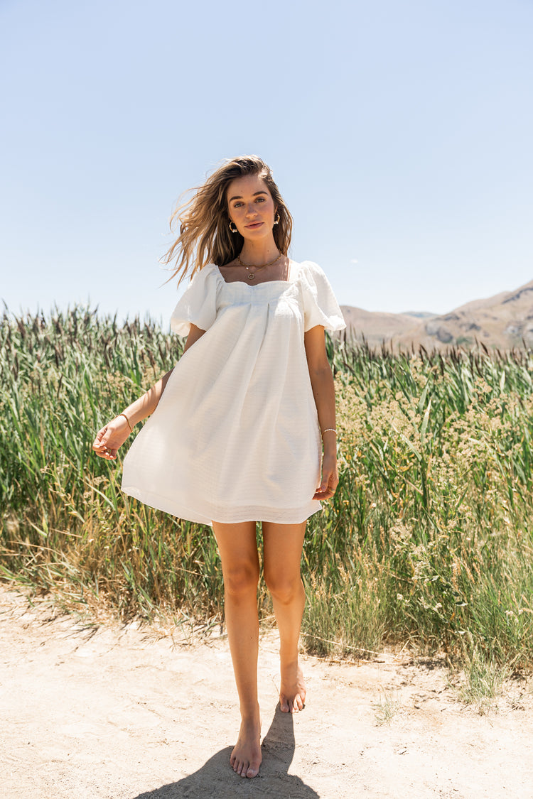 Two hand pockets mini dress in off white 