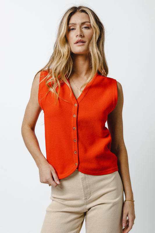 red textured sleeveless vest 