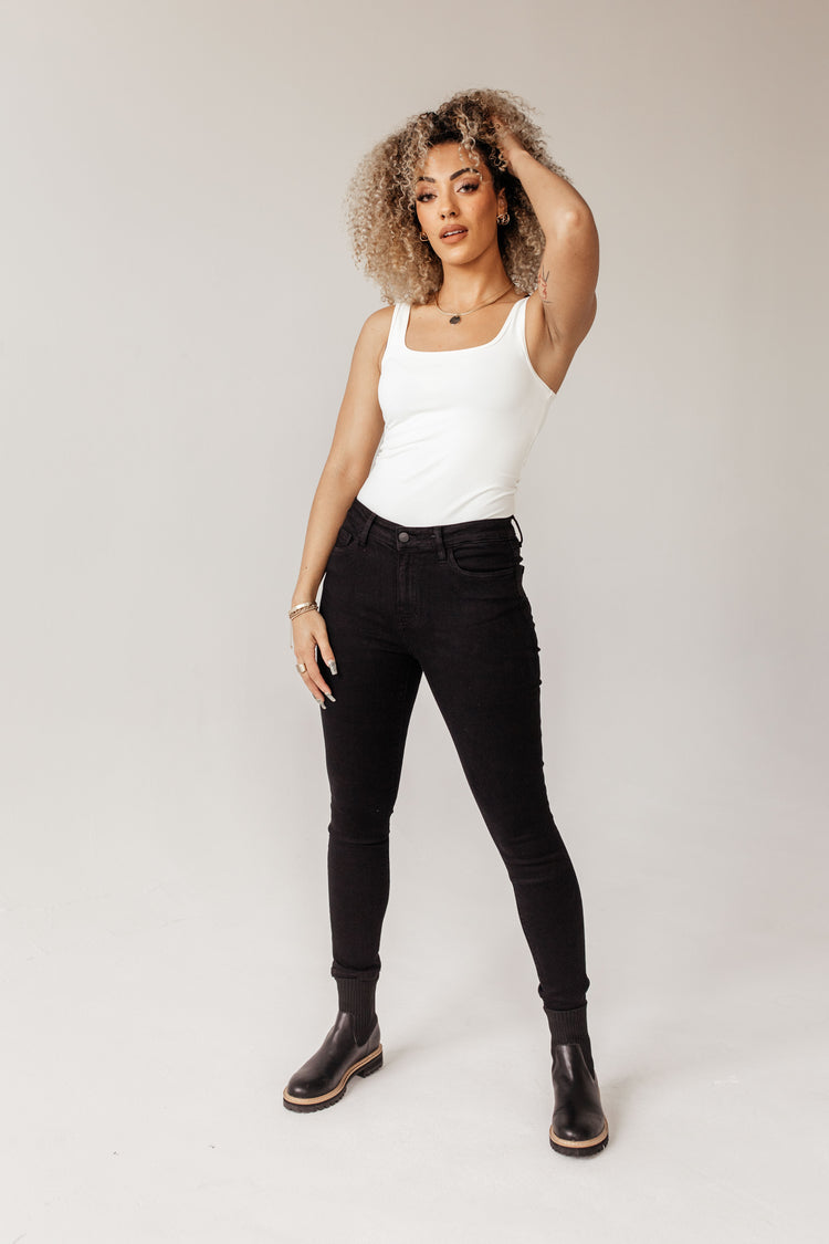 mid-rise skinny jeans with no distressing