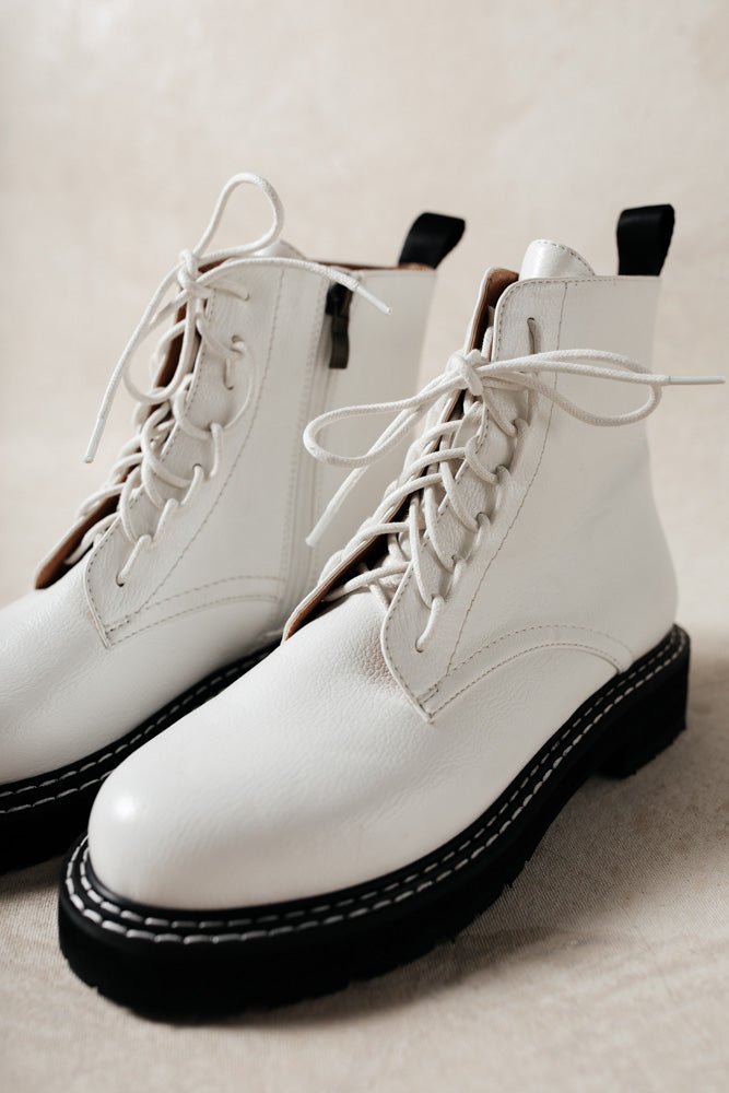 white lace up boots