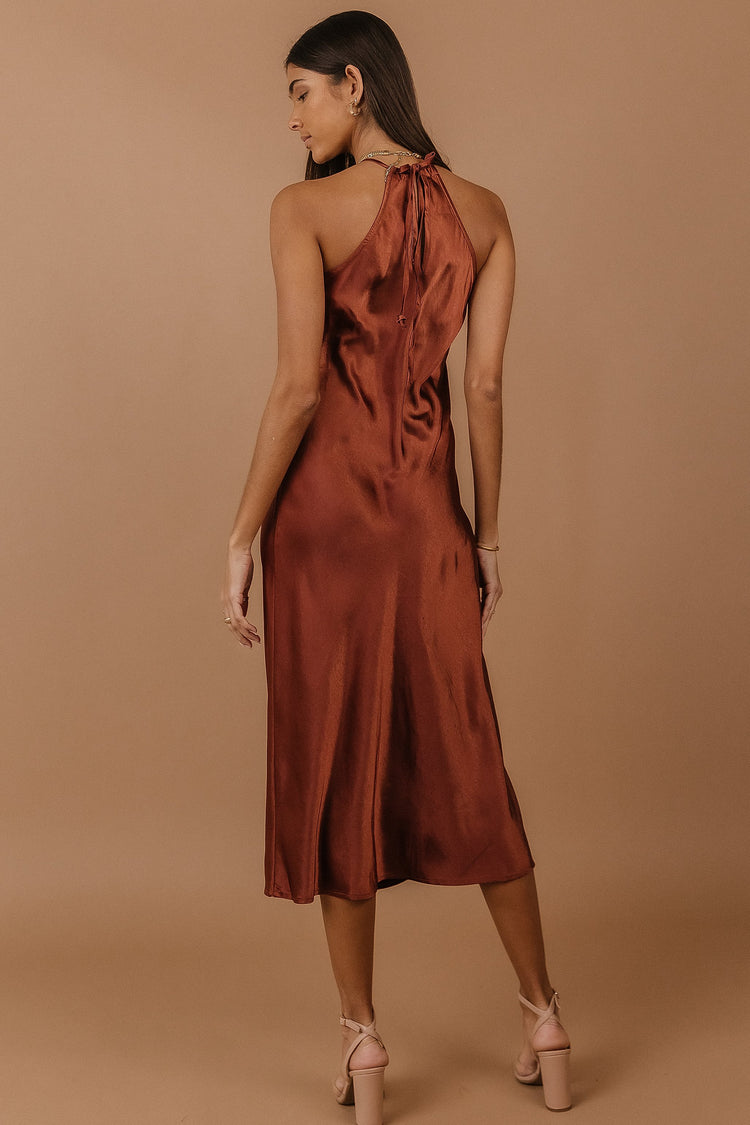 halter neck rust colored midi dress