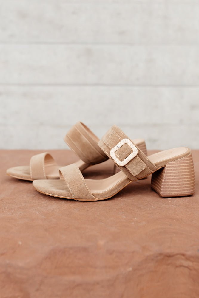The Nicole Block Heels have two straps, a buckle, and short block heel. Sandals have a faux suede material.