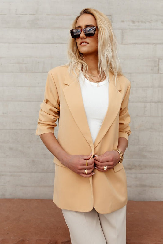 loose fitted tangerine blazer