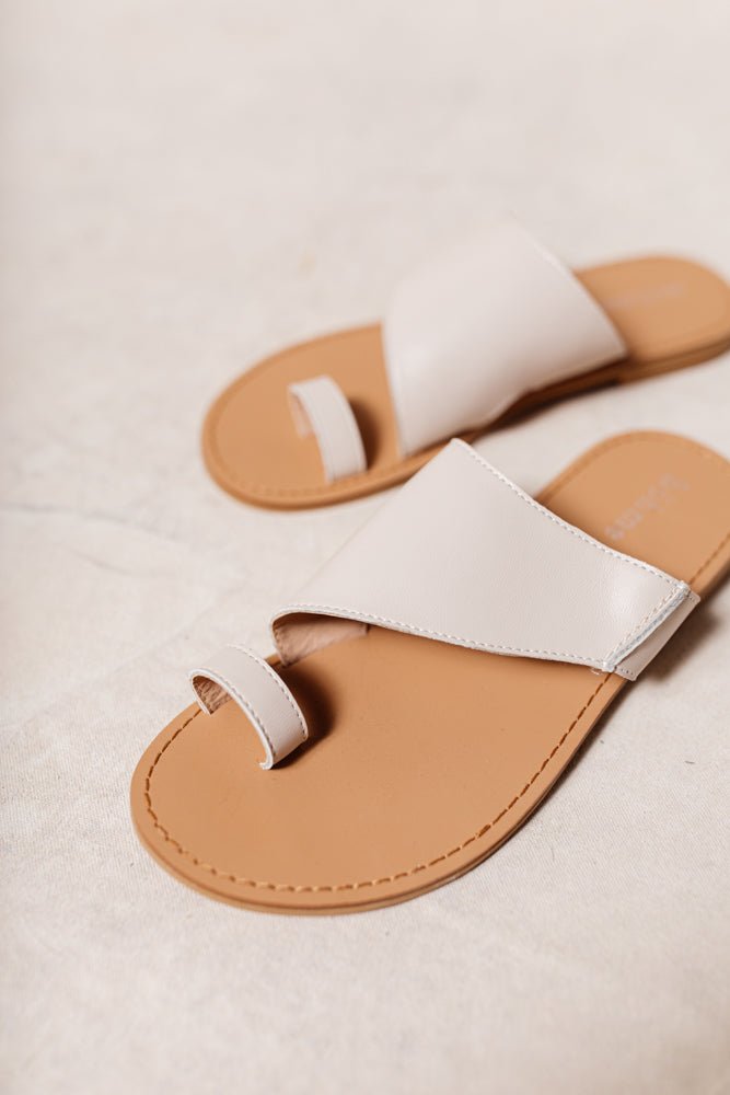 flat beige sandal with toe strap