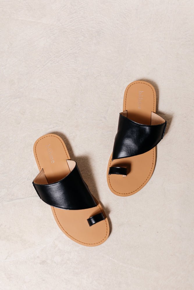 flat sandal with toe strap