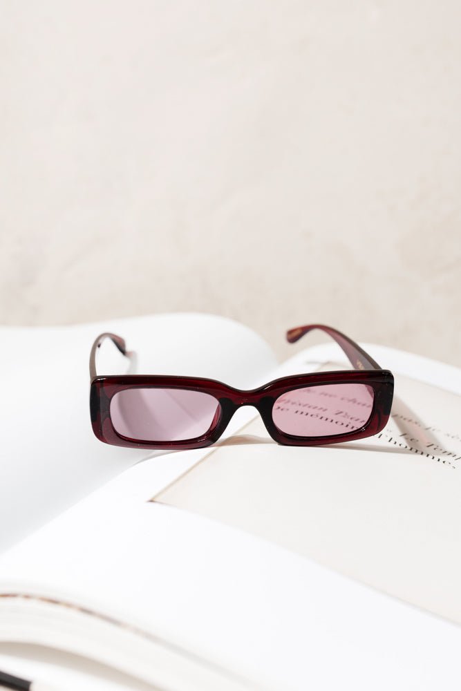 rectangular framed sunglasses with tinted lens