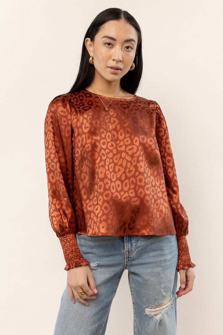 rust blouse with leopard print