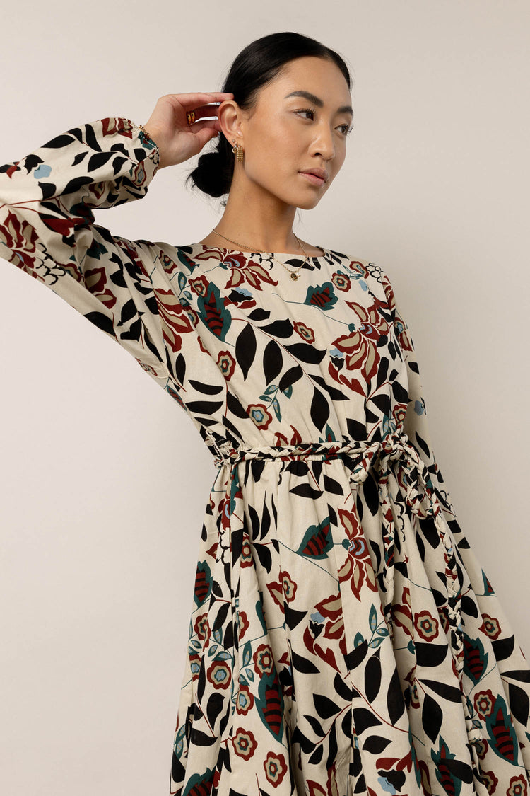 model wearing a floral mini dress