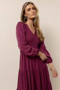 tiered midi dress with cinched long sleeves
