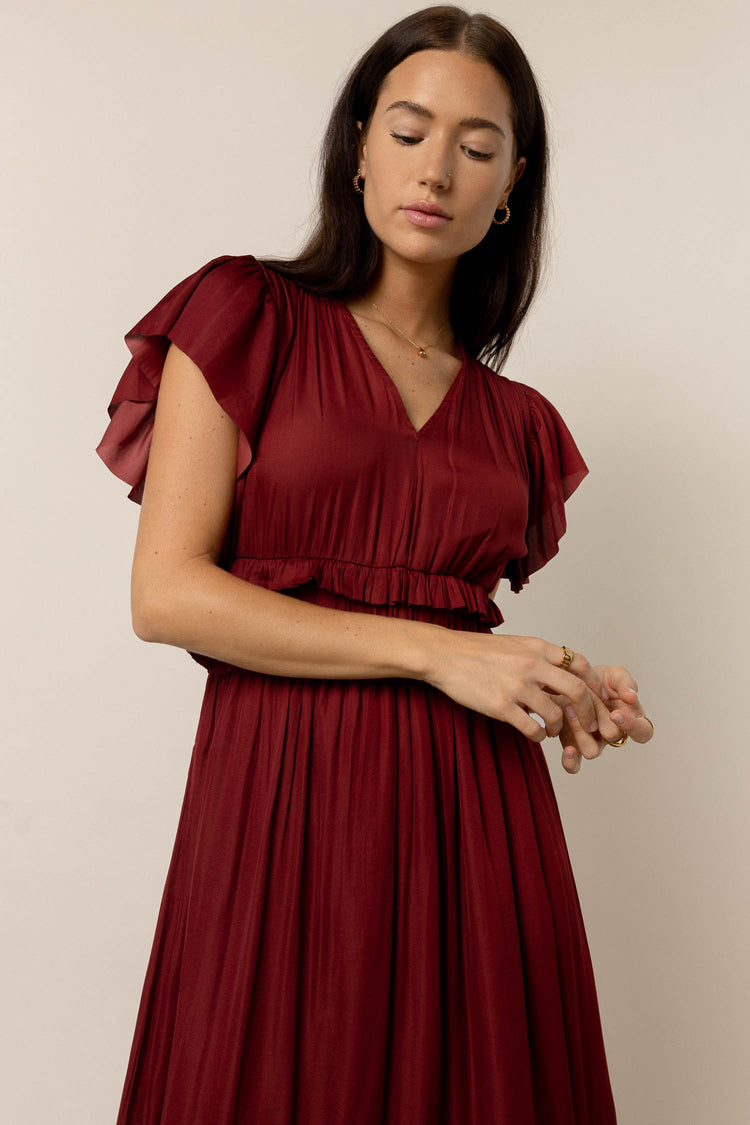 red dress with flutter sleeves
