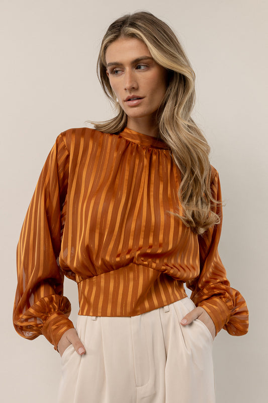 loose fitted orange striped blouse