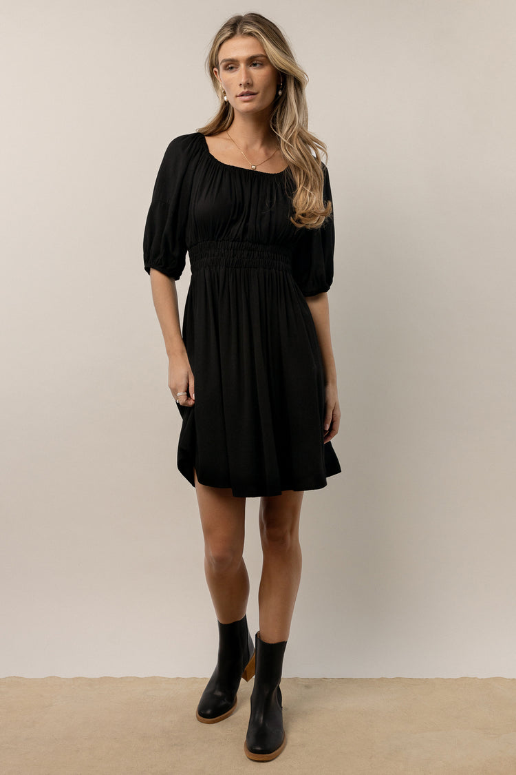black mini dress with short sleeves