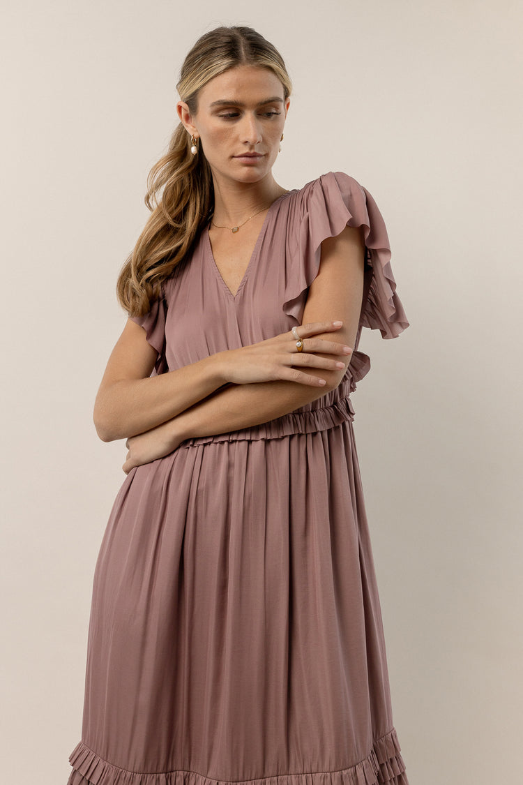 purple dress with flutter sleeves