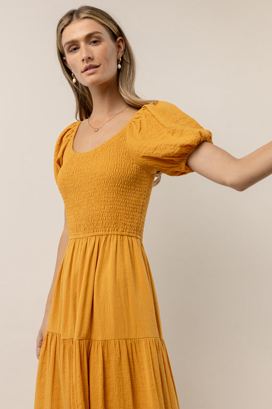 dress with smocked bodice and short sleeves