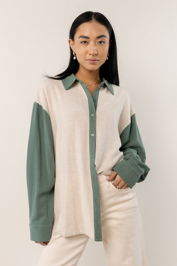 green oversized button up with long sleeves