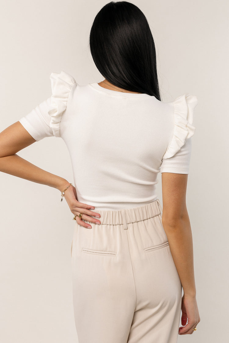 short sleeve bodysuit with ruffle shoulder detail