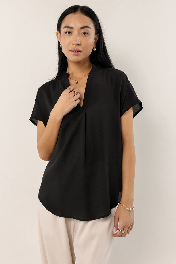 black blouse with V-neck