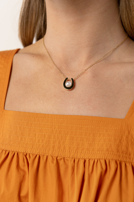 gold horseshoe necklace with pearl detail