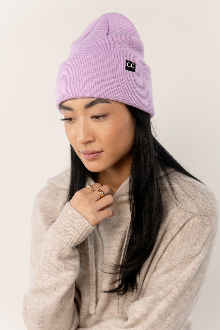 purple knit cap with front logo detail