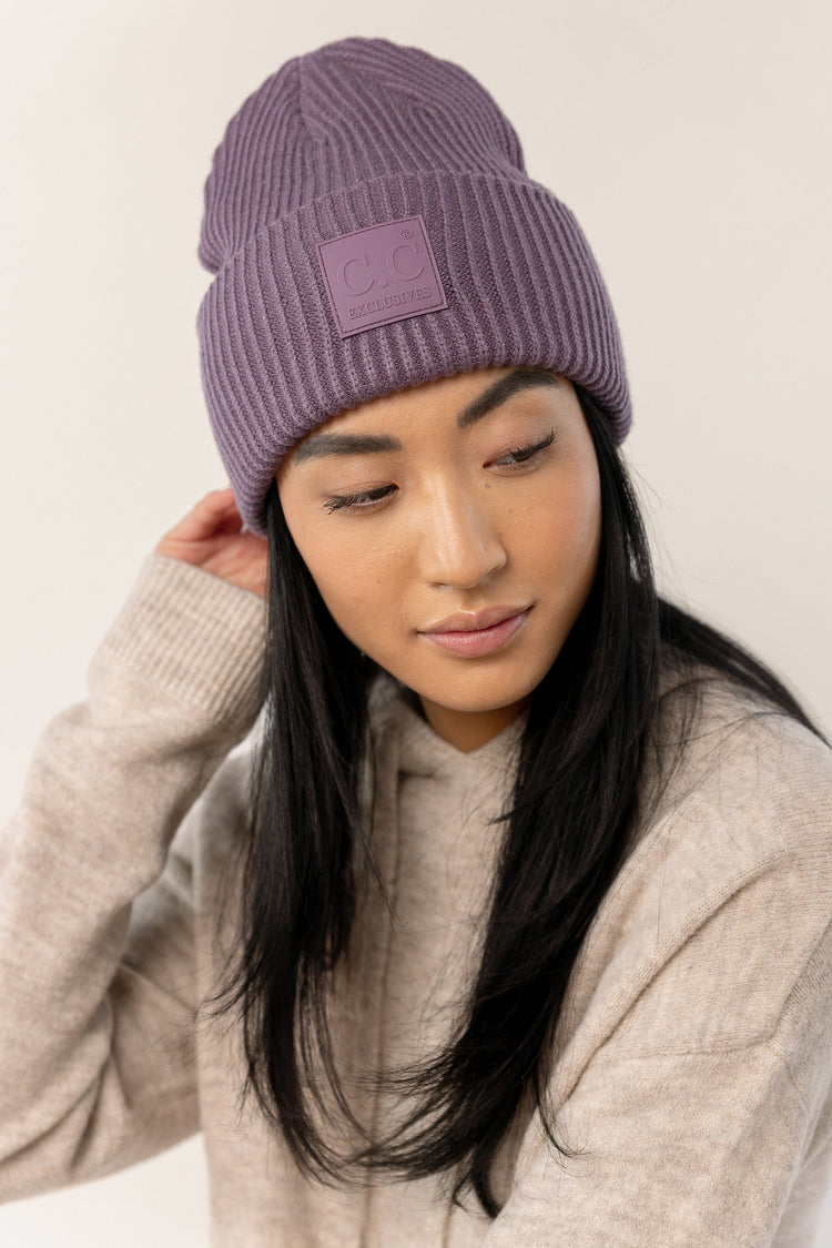 purple beanie with front logo detail