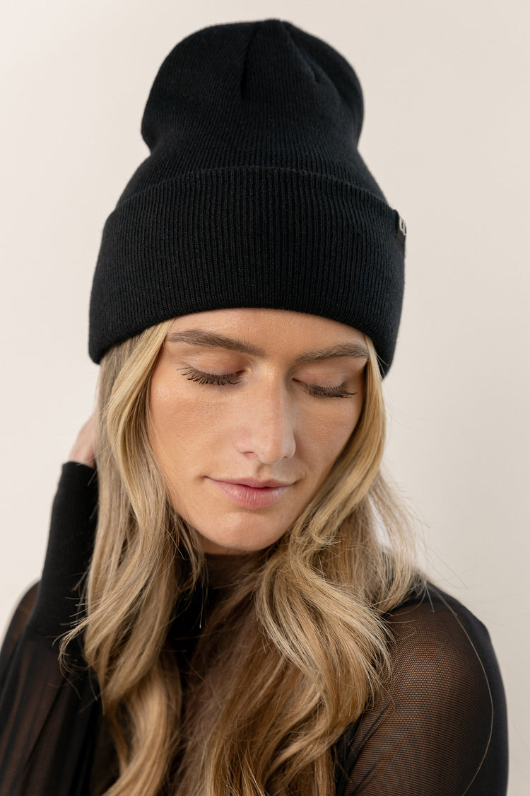 black knit beanie with foldover detail