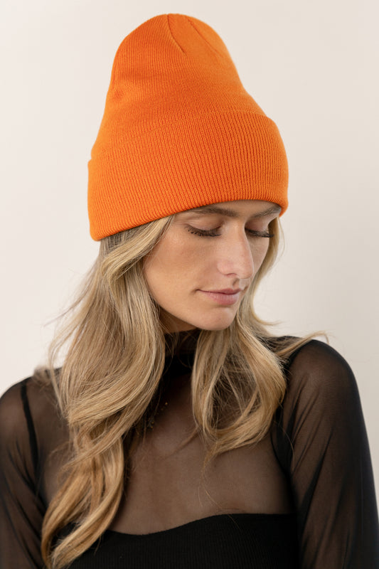 knit beanie in orange color