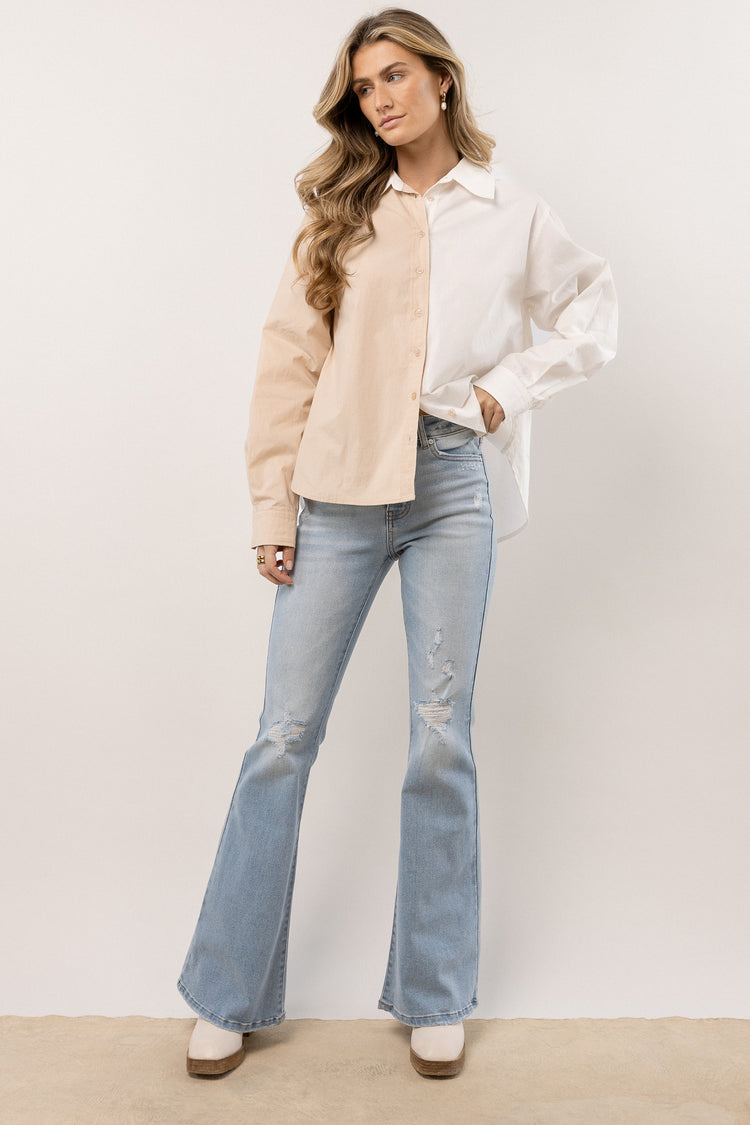 oversized collared top with long cuffed sleeves