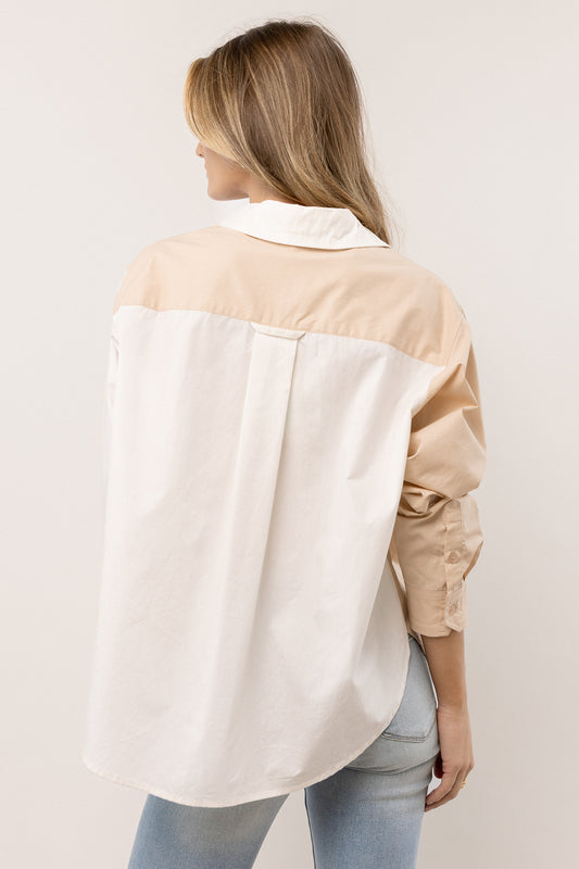 tan and white colorblocked long sleeve top