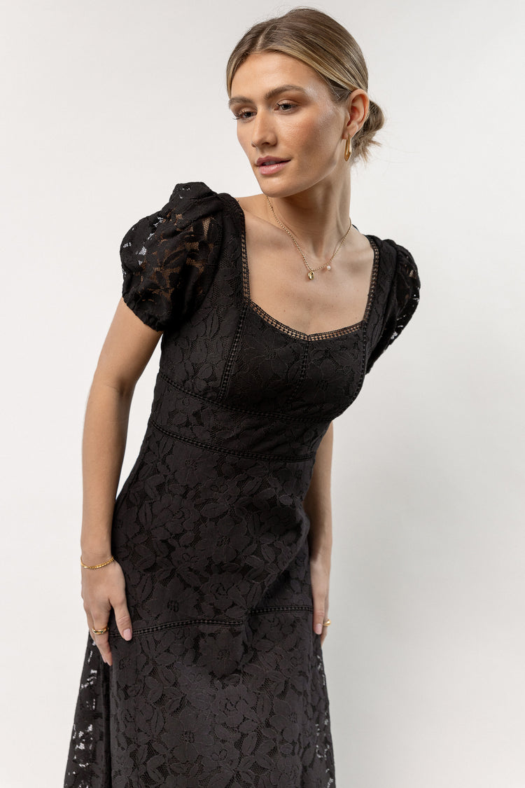 black dress with sweetheart neckline