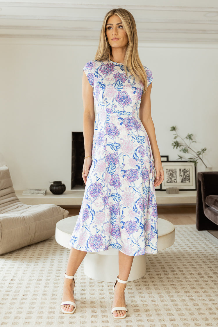 synched floral midi dress with white heels
