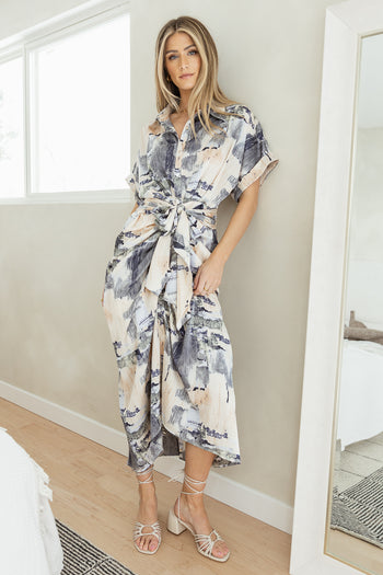 printed dress with a tied midi section and tie shoes