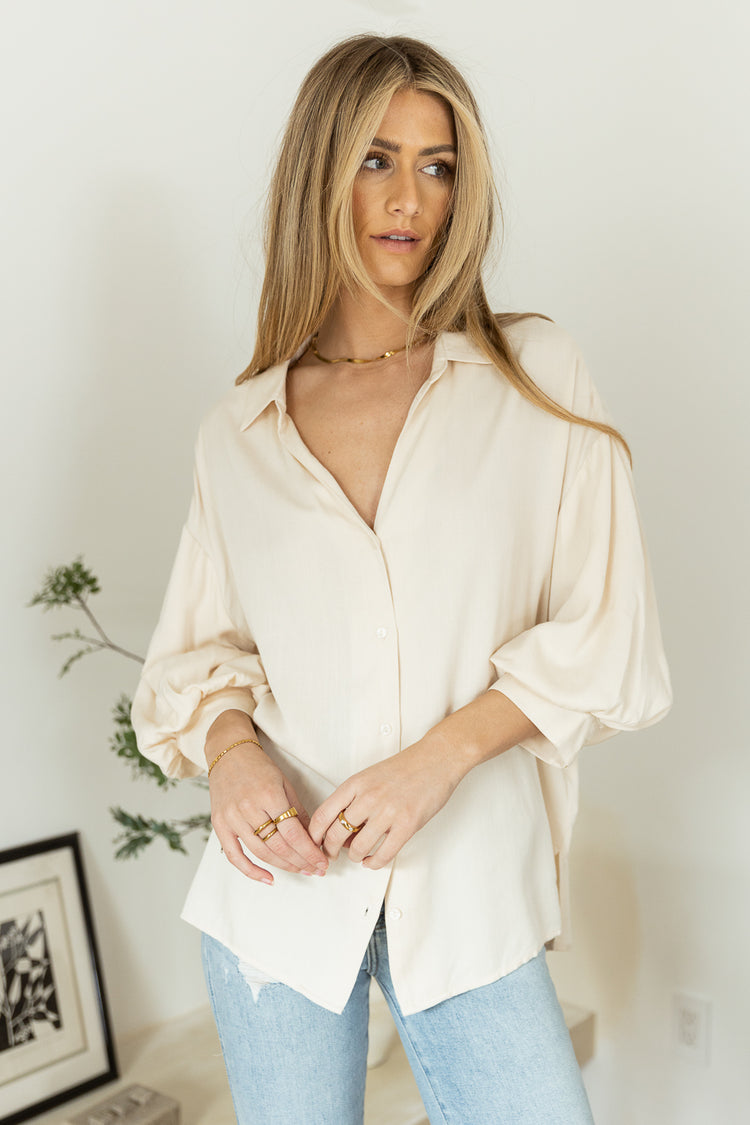 cream button up with puff sleeve detail 