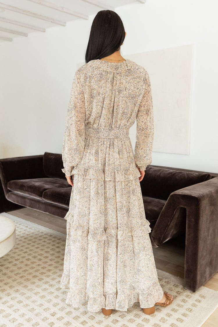 backside of long sleeve printed maxi dress