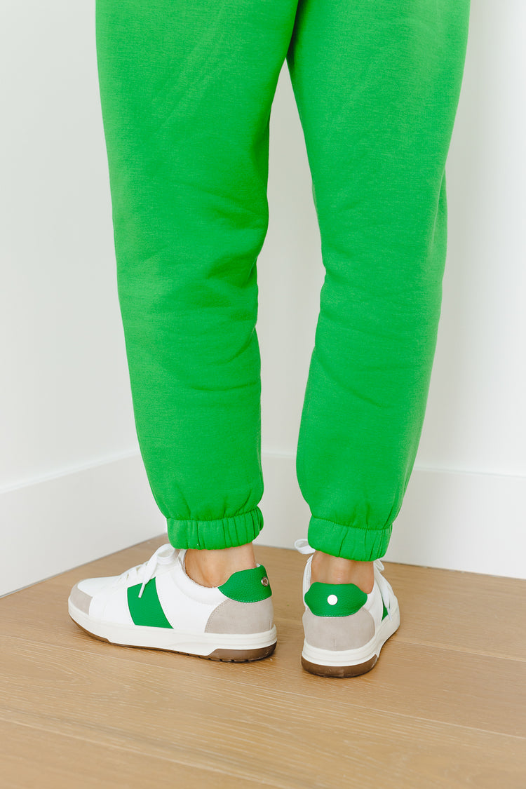 womens green and white sneakers with green sweatpants