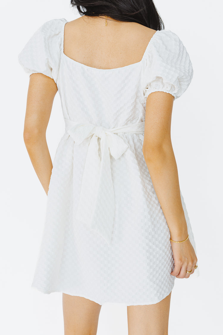 Adjustable back strap mini dress in white 