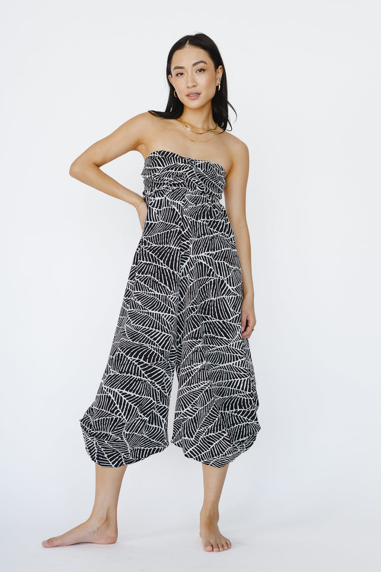 printed jumpsuit with gold jewelry 