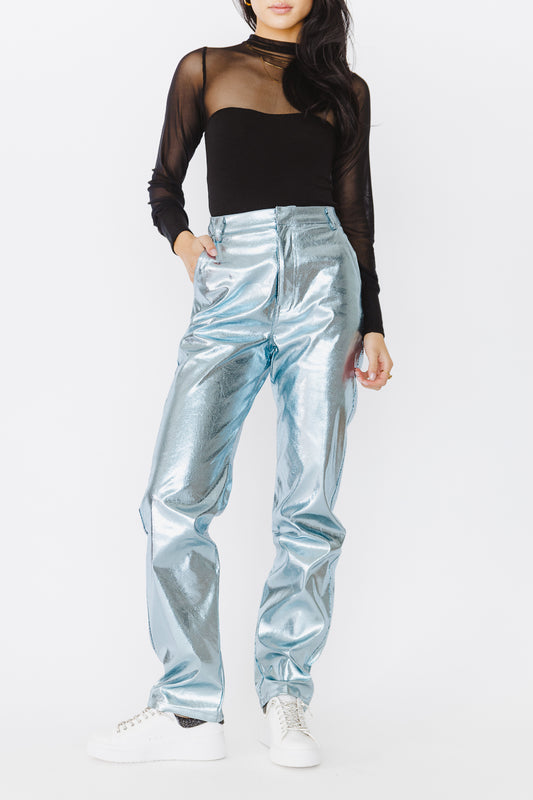 Metallic pants in blue paired with a Long sleeve top in black 
