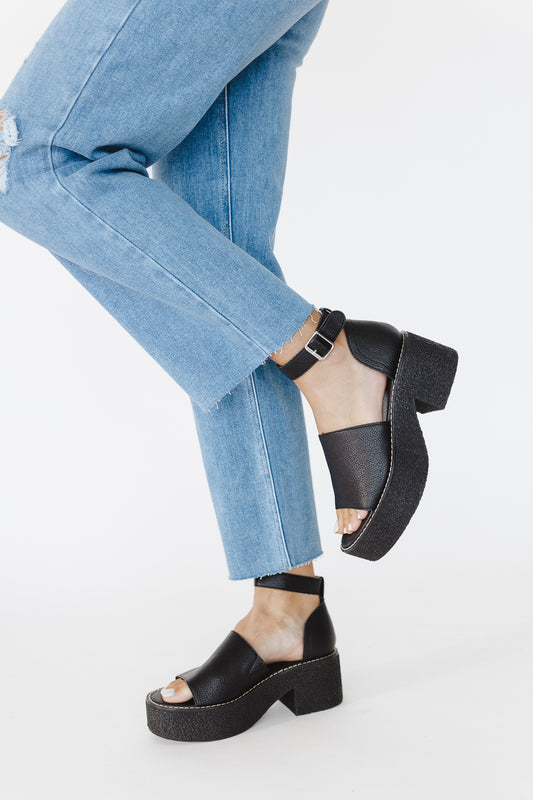 black strappy heel with denim 